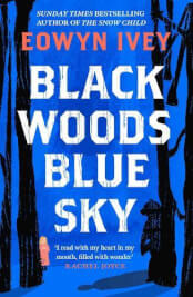 BLACK WOODS BLUE SKY.
